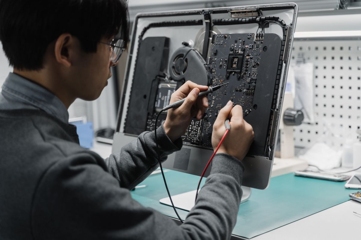 Technician repairing a computer